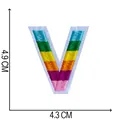 Rainbow embroidered letter V patch with dimensions 4.9 x 4.3 cm for DIY clothing - Letter V