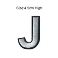Detailed silver embroidered letter J patch with black border, size 4.5cm high for DIY - Letter J
