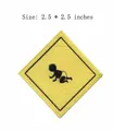 Embroidered yellow diamond patch featuring a crawling baby silhouette, 2.5x2.5 inches size. - Baby Warning Sign Style (HS1306040) / 1 Piece