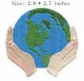 Detailed embroidered Earth and hands iron-on patch for DIY clothes, size 2.8x2.7 in - Earth Hands Style (HS1603055)