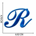 Toppa ricamata lettera R blu corsivo termoadesiva per abbigliamento fai da te - Lettera R