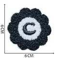 Detailed view of a 6cm chenille embroidered flower patch with letter C for DIY - Letter C / 6x6cm