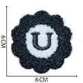 Chenille embroidery patch in black and white flower shape with letter U, size 6x6 cm. - Letter U