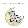 Cartoon cow sleeping on yellow moon iron-on embroidered patch, size 2.7x2.1 inches - Sleeping Cow On Moon (AFCA361)