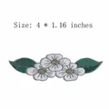 Embroidered white flower and green leaf iron-on clothing patch, size 4x1.16 inches - Three White Flowers (AFCA427)