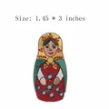 Russian Matryoshka doll embroidered iron-on patch for clothing decoration, size 1.45 x 3 inches - Colorful Matryoshka Doll (AFCA623)