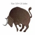 Brown bull embroidered iron-on patch for clothing decoration, measures 3.0 x 1.6 inches - Bull Style (HS1402001)