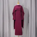 Detailed view of elegant purple evening dress with integrated cape and long sleeves - Purple