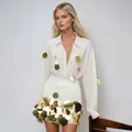 Elegante conjunto blanco de dos piezas con camisa de manga larga y falda de lentejuelas - Blanco