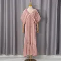 Detail view of pink romantic V-neck maxi dress with puffy sleeves and 3D floral appliques - M / Dresses / Pink