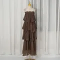Elegant brown tiered maxi dress with delicate lace trim displayed on a mannequin - S / Dresses / Brown