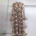 Elegant brown lace embroidered maxi dress featuring luxury feather cuffs and pearl buttons - S / Dresses / Brown