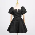Elegant black French style puff sleeve mini dress shown on a professional display mannequin - S / Dresses / Black