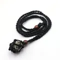 Handmade natural dalmatian stone pendant necklace with black braided cord and wooden beads - Spotted Stone
