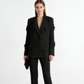Elegante americana negra con apliques florales en 3D y pantalones a juego - S / Top Y Pantalón / Negro