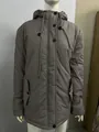 Front view of women's grey hooded winter jacket with zipper and pockets on mannequin - S / Tops / Gray