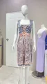 Detailed view of a traditional Oktoberfest Dirndl dress with blue bodice and lace apron - 3XL / Dresses / Pink