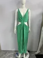 Front full view of a green V-neck sleeveless pleated maxi dress with waist cut-outs - S / Dresses / Green