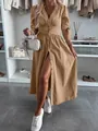 Detailed view of fashionable V-neck button-down tan denim long dress with tie-sleeve accents - Khaki