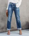 Eleganti jeans dritti in denim blu urbano con una chiusura asimmetrica a bottoni incrociati unica. - Taglia S / Pantaloni e gonne / Blu
