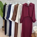 Elegante abito lungo dritto minimalista con bottoni a revers in vari colori moda - Bianco