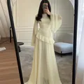 Elegant cream maxi dress with ruffled waist and flared bell sleeves for autumn. - XS / Dresses / Light Yellow