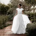 Robe de mariée blanche minimaliste élégante avec corsage en dentelle et jupe fluide - US16 / Robes / Blanc