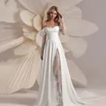 Elegant off-shoulder white wedding gown featuring lace sleeves and a high slit small train - XL (US 8) / Dresses / White