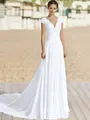 Elegant white V-neck lace wedding dress with a small train and slim fit silhouette - 16W / Dresses / White