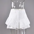 Stylish white layered ruffled A-line mini cake skirt for modern summer fashion outfits - S / White