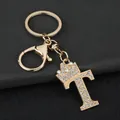 Detailed view of elegant gold letter T keychain with sparkly rhinestones and crown - Letter T Decoration (YJ—310) / Gold