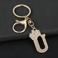 Close-up of elegant gold rhinestone crown letter U keychain for handbag decoration - Letter U Decoration (YJ—310) / Gold