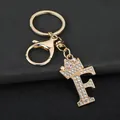 Close-up of gold letter F keychain with sparkling rhinestones and crown detail. - Letter F Decoration (YJ—310) / Gold