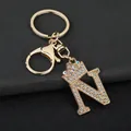Detailed view of gold-tone letter N keychain with crown and sparkling rhinestones - Letter N Decoration (YJ—310) / Gold
