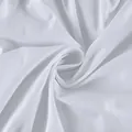 Close-up of high-quality pure cotton fabric texture with soft white folds - S / White