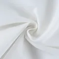 Close-up macro view of white sheer chiffon fabric with elegant soft draped swirl texture. - S / Bottoms / White