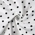 Macro detail of white silk-like fabric with elegant black polka dots and soft sheen - S / White