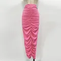 Detail of pink knitted midi skirt featuring elegant ruching and sparkling rhinestones. - S / Bottoms / Bright Pink Long Skirt