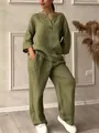 A detailed look of olive green linen-style casual set featuring a V-neck top and wide-leg pants - Army Green