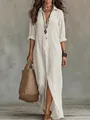 Détail d'une longue robe blanche en lin avec fente frontale et col chemise boutonné - S / Robes / Blanc