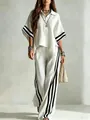 Vista completa de un elegante conjunto blanco de dos piezas con rayas negras en mangas y pantalón. - S / Top Y Pantalón / Blanco