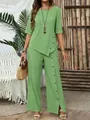 Elegant green two-piece set featuring asymmetrical hem and decorative side buttons - Light Green