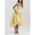 Elegantes gelbes Trägerkleid mit V-Ausschnitt und mehrlagigem Tüll-Puffrock-Detail - S / Kleider / Gelb