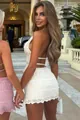 Detailed view of a stylish white tiered lace mini skirt set with elegant strappy back - S / Top And Bottom / Apricot