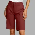 Detailed view of women's burgundy bermuda suit shorts with front pockets and button closure - S / Bottoms / Burgundy