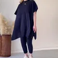 Conjunto negro de punto de dos piezas para mujer con top murciélago y leggings - Azul marino