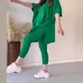 Conjunto informal de dos piezas de punto verde vibrante con mangas murciélago y cuello redondo - Verde