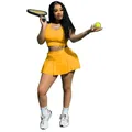 Ensemble sport deux pièces jaune vif pour femme avec débardeur ajusté et jupe de tennis plissée - XS / Haut Et Bas / Jaune