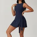 Navy blue sleeveless athletic dress with faux two-piece design and side-tie detail. - S / Dresses / Navy Blue