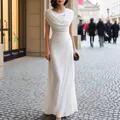 Elegant white floor-length maxi dress featuring a draped cowl neck and ruched waist design - S / Dresses / White